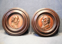 Pair of Gladstone and Disraeli Cast Iron Plaques