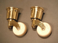 Pair of Brass and Ceramic Castors C25