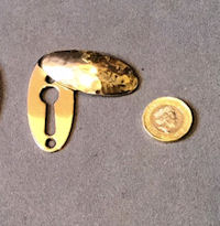 Run of Brass Keyhole Covers KC435
