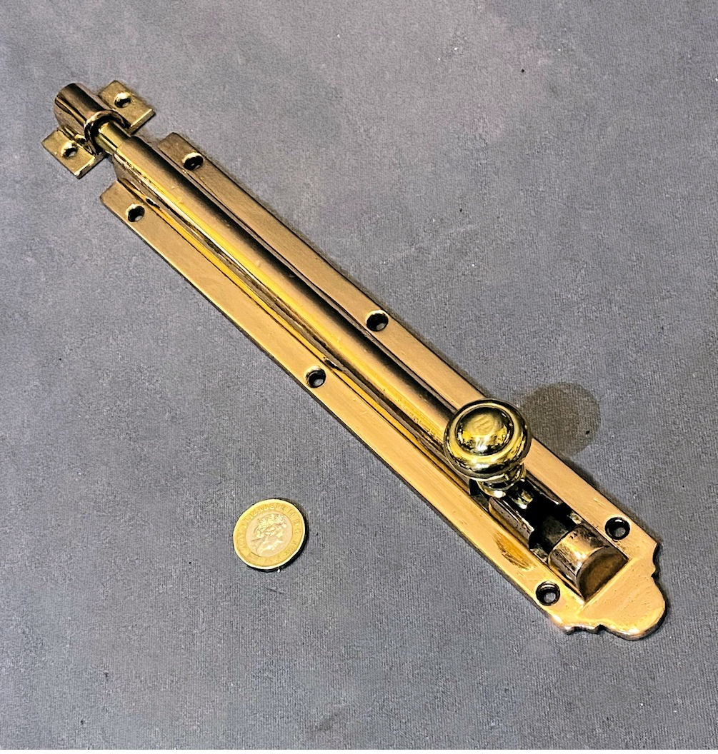10" Pink Brass Door Bolt — Brass, late 19th century