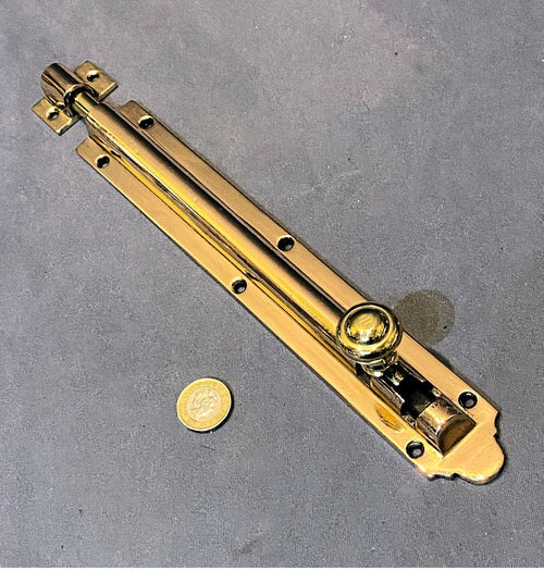 10" Pink Brass Door Bolt — Brass, late 19th century