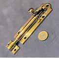 4.5" Brass Door Bolt — Brass, late 19th century
