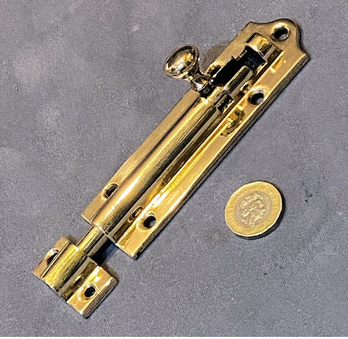 4.5" Brass Door Bolt — Brass, late 19th century