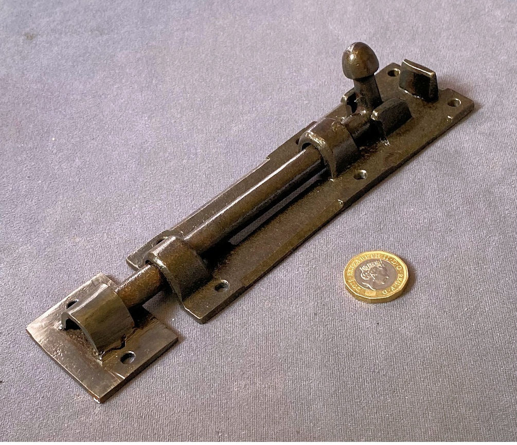 6" Cast Iron Door Bolt — Cast iron, late 19th century