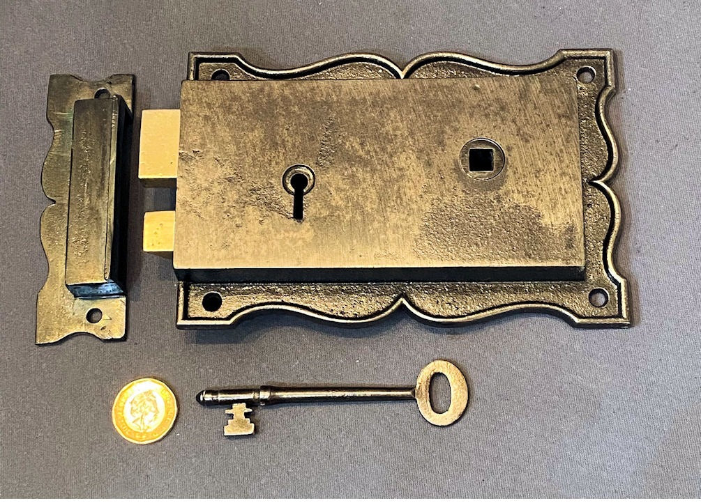 6 Matching Cast Iron Rim Locks — Cast iron, 1911
