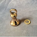 8 Ounce Brass Weight — Brass, late 19th century