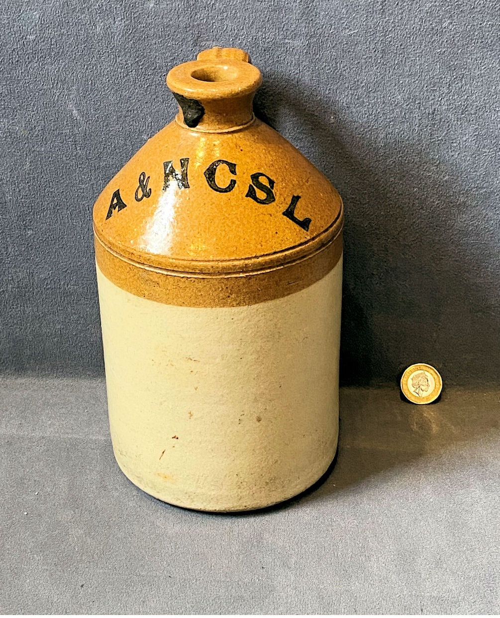 A & N C S L Stoneware Flagon — Stoneware, late 19th century
