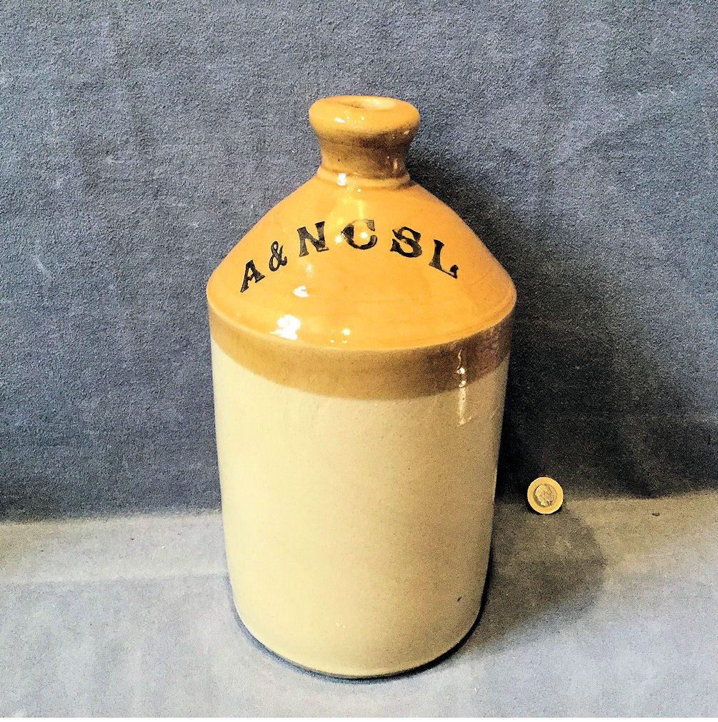 Army & Navy Co.operative Stores Stoneware Flagon — Stoneware, late 19th century