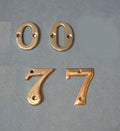 Assorted Brass Numbers for House Doors — Brass, 1920
