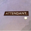 Attendant Bakelite Plaque — Bakelite, 1920's