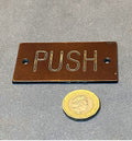 Bakelite Push Plaque — Bakelite, 1920's