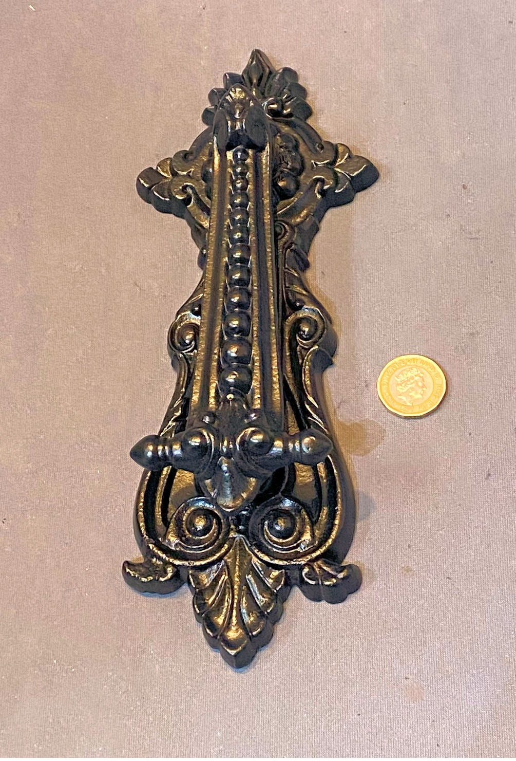 Baldwin Cast Iron Door Knocker — Cast iron, late 19th century