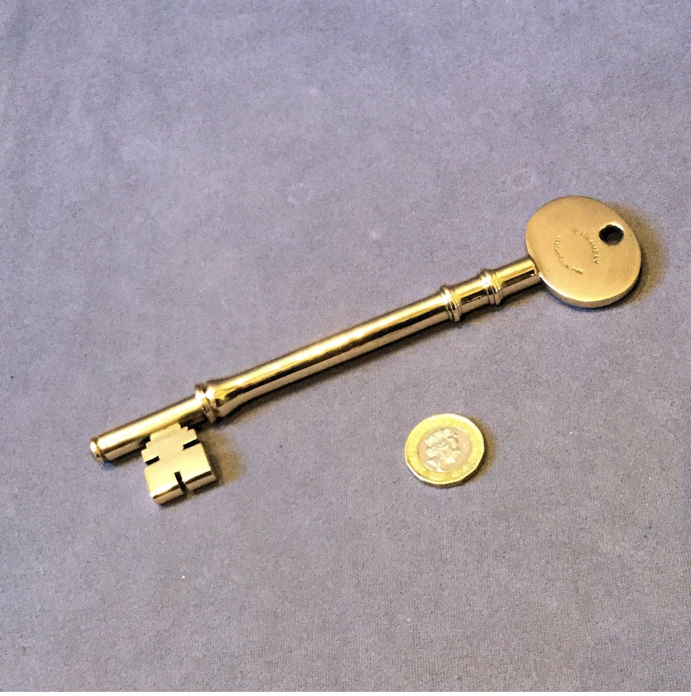 Brass Door Key — Brass, late 19th century