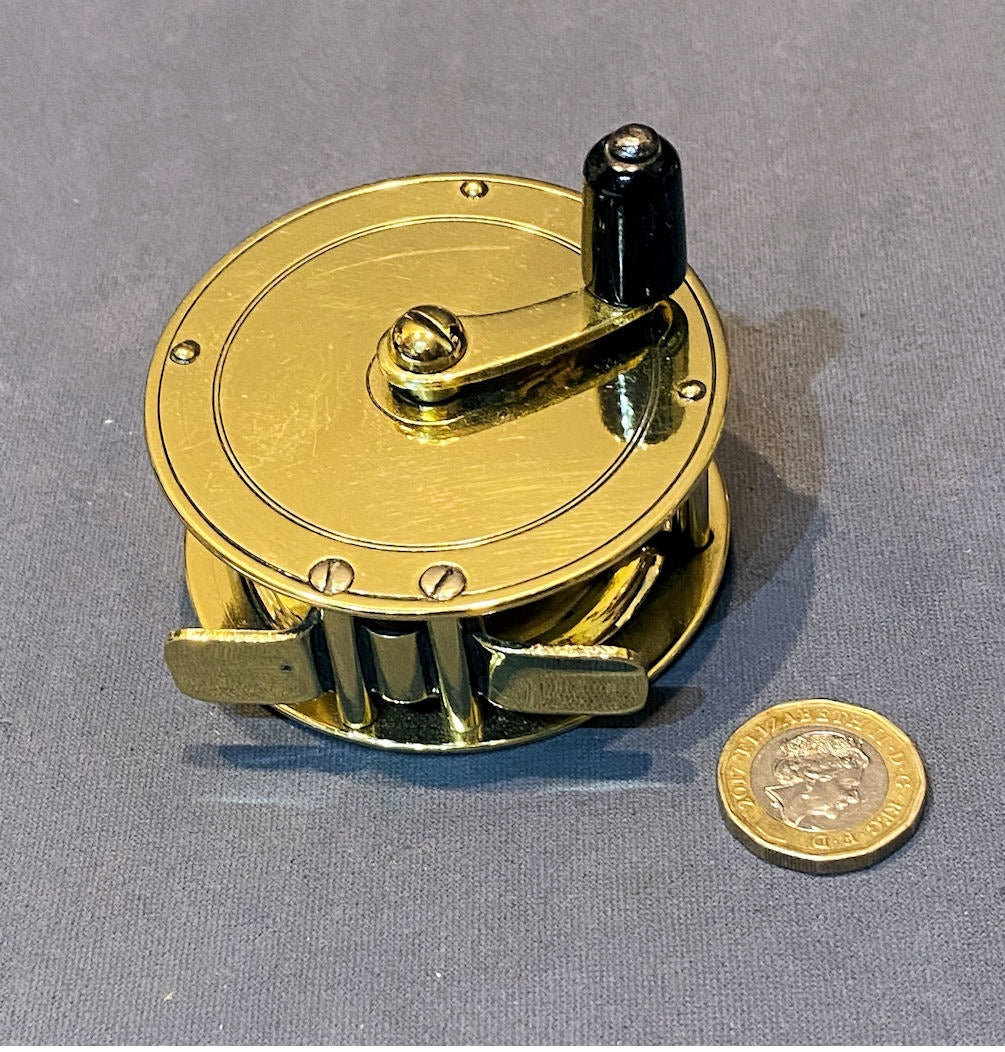 Brass Fishing Reel — Brass, late 19th century