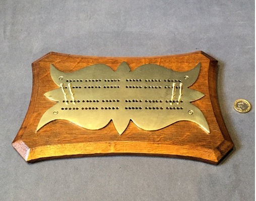 Brass on Oak Crib Board — Brass, circa 1900