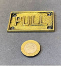 Brass Pull Plate — Brass, late 19th century