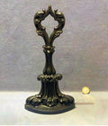 Cast Iron Door Porter — Cast iron, late 19th century