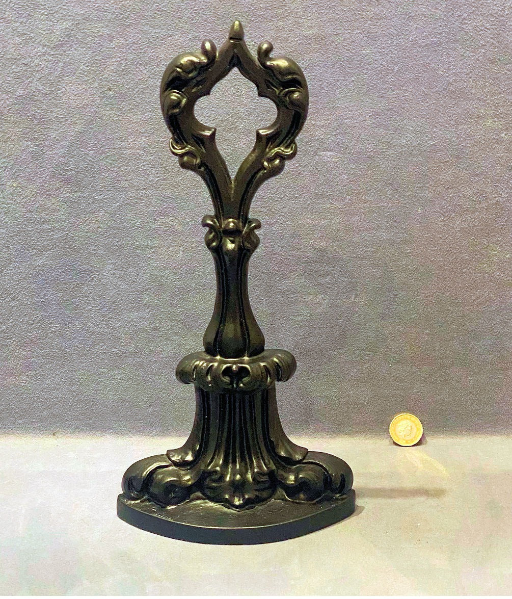 Cast Iron Door Porter — Cast iron, late 19th century