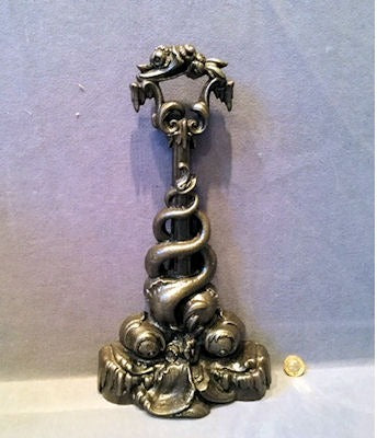 Cast Iron Door Porter — Cast iron, late 19th century