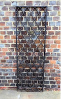 Cast Iron Window — Cast iron, late 19th century