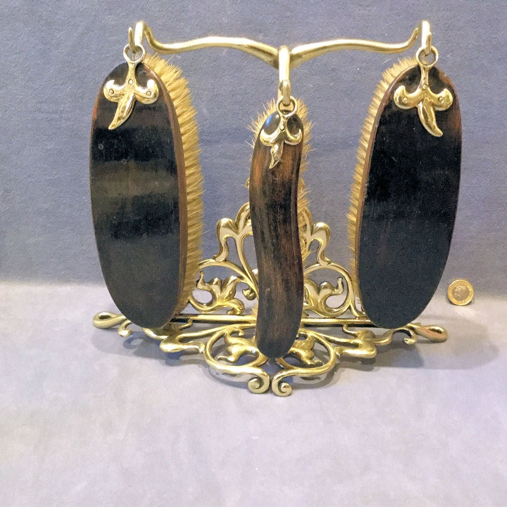 Clothes Brushes on Stand — Brass, late 19th century