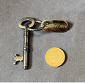 Dairy Farm Brass Tag with Key — Brass, circa 1900