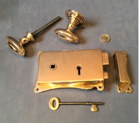 Elsleys Pink Brass Rim Lock with the original matching handle — Brass, circa 1900