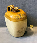Encore Stoneware Whisky Jug — Stoneware, late 19th century