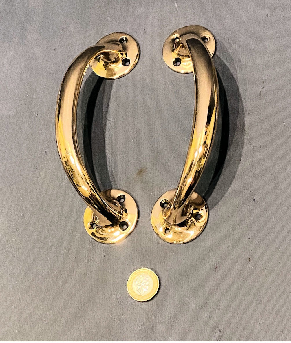 f Pair of Brass Door Pulls — Brass, circa 1930