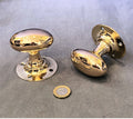 g Pair of Oval Brass Door Handles — Brass, 1920's