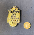 John Tann Safe Keyhole Cover — Brass, late 19th century