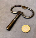 Larger Steel Clock Key — Steel, late 19th century