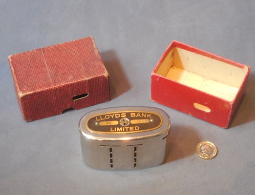 Lloyds Bank Money Box, 2 available — Chrome, 1921