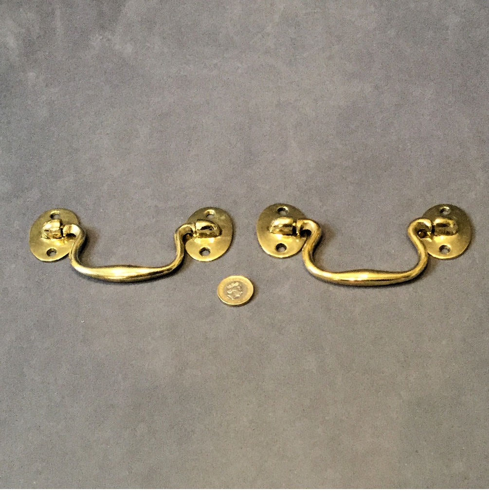 Near Pair of Brass Drawer Handles — Brass, late 19th century