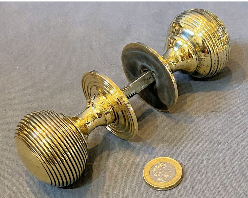 Near Pair of Ribbed Brass Door Handles — view 2