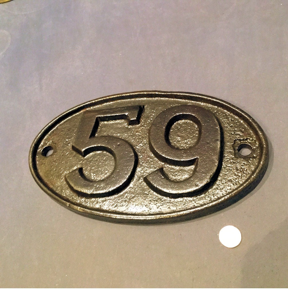 No 59 Cast Iron Plaque — Cast iron, late 19th century
