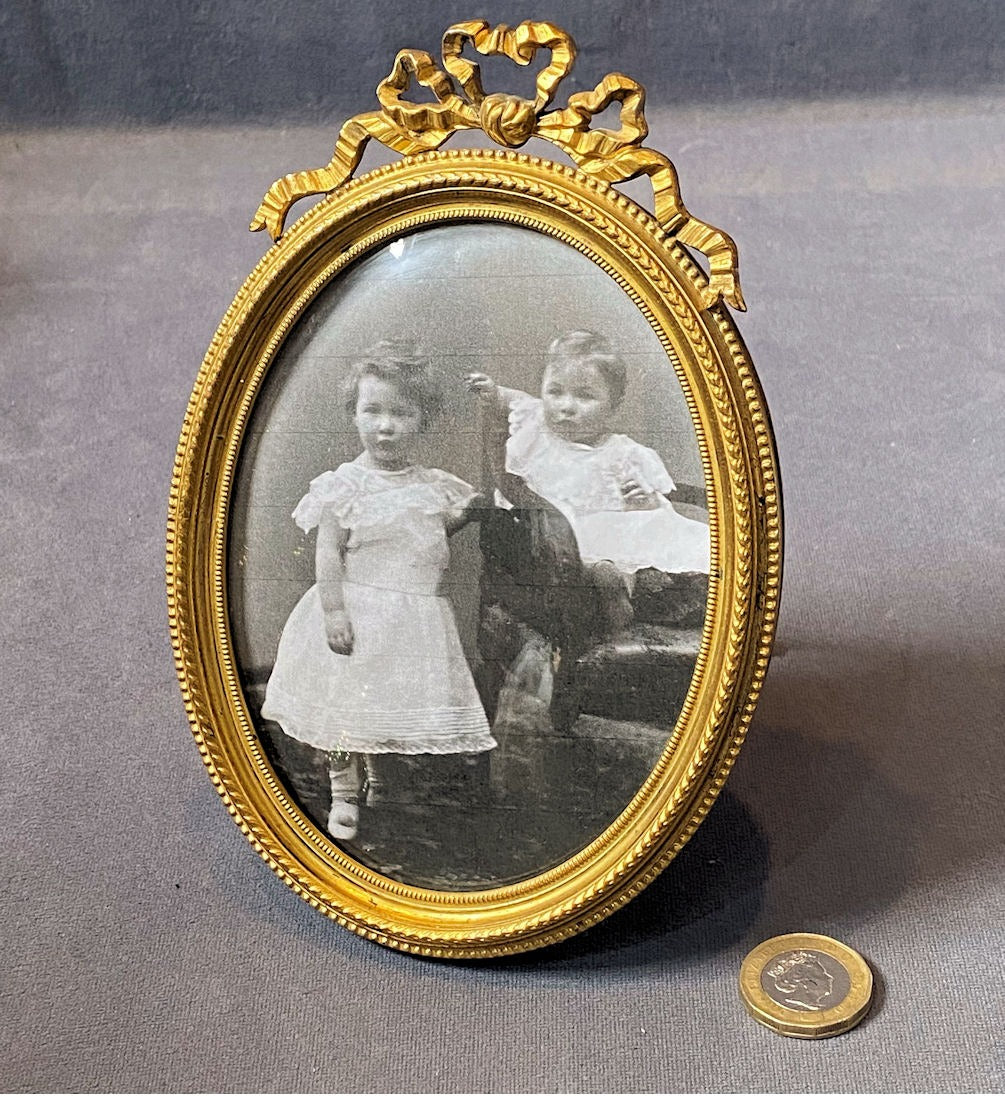 Oval Brass Photograph Frame — Brass, late 19th century