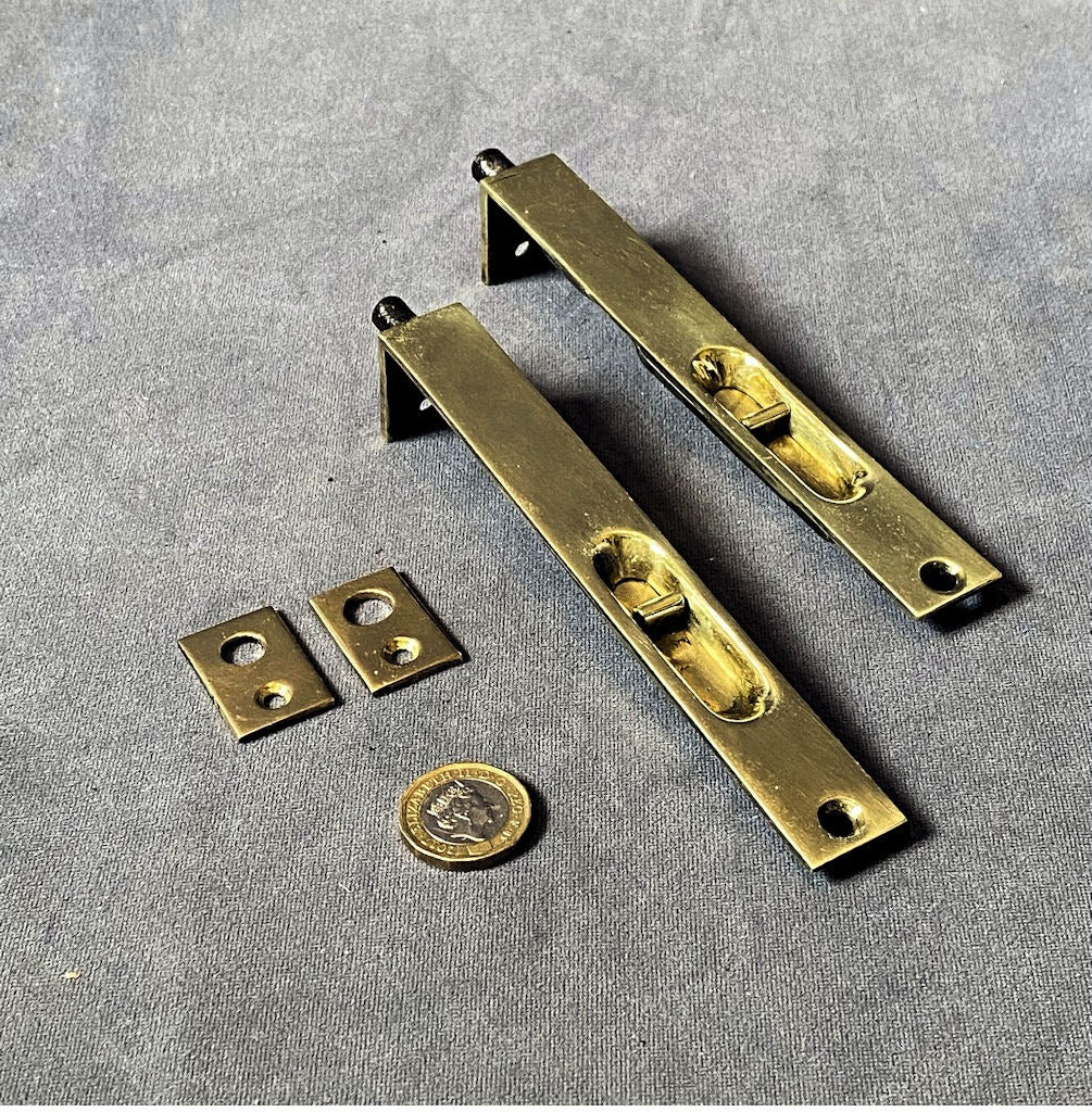 Pair of 6" Recessed Brass Door Bolts — Brass, late 19th century
