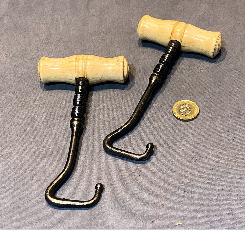 Pair of Bone Handled Boot Pulls — Steel, late 19th century