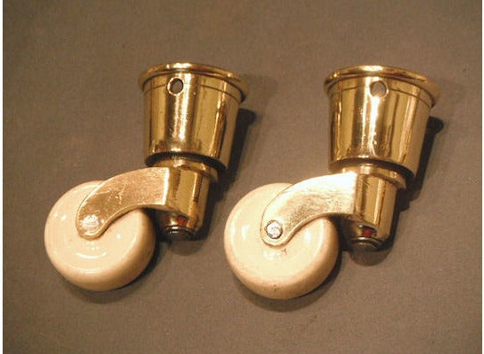 Pair of Brass and Ceramic Castors — view 2