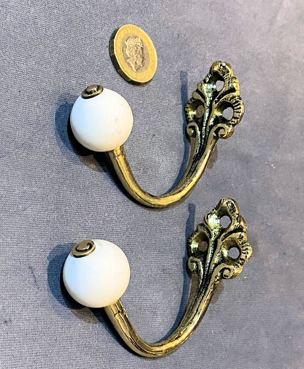 Pair of Brass & Ceramic Hat or Coat Peg — Brass, late 19th century