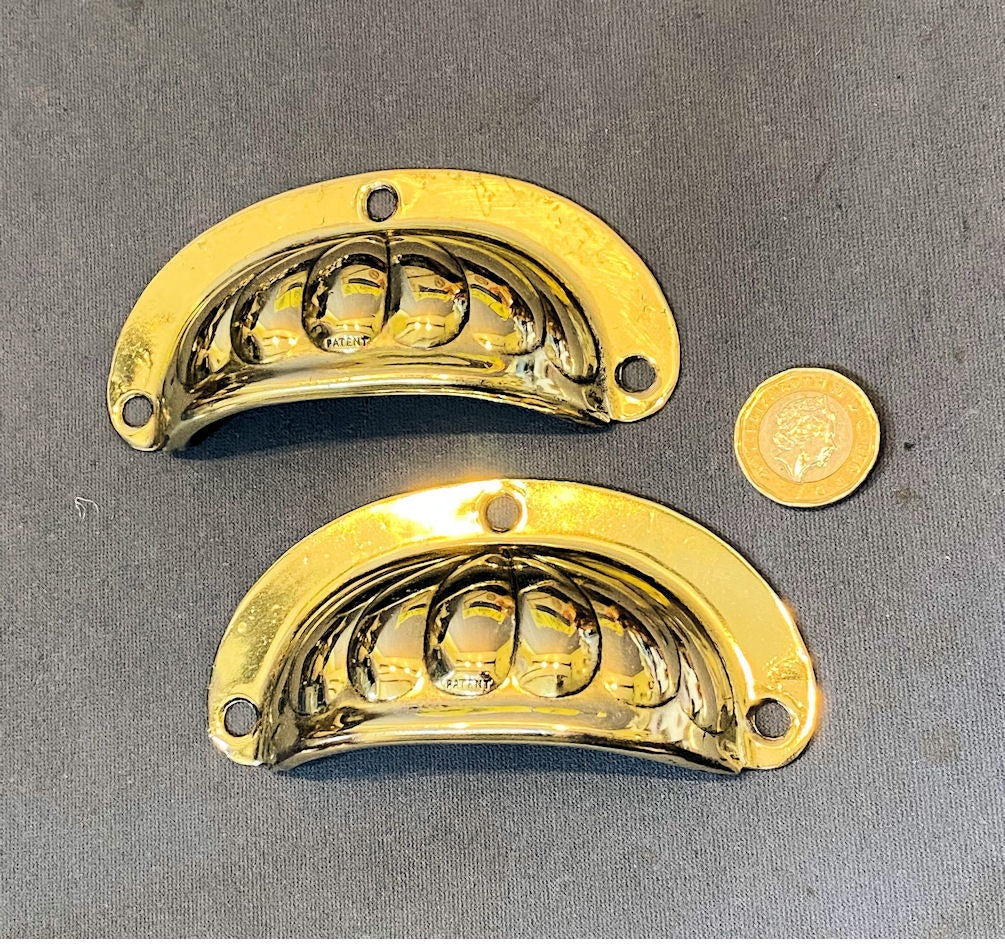 Pair of Brass Cup Drawer Handles — Brass, late 19th century