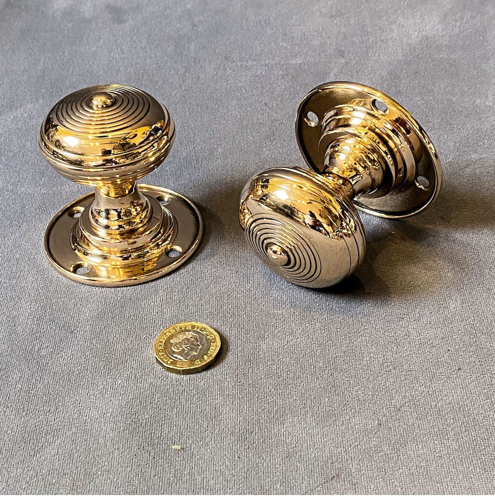 Pair of Brass Door Handles — Brass, late 19th century