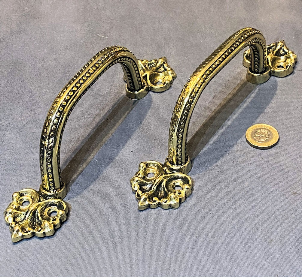 Pair of Brass Door Pulls — Brass, late 19th century