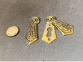 Pair of Brass Keyholes with Covers — Brass, late 19th century