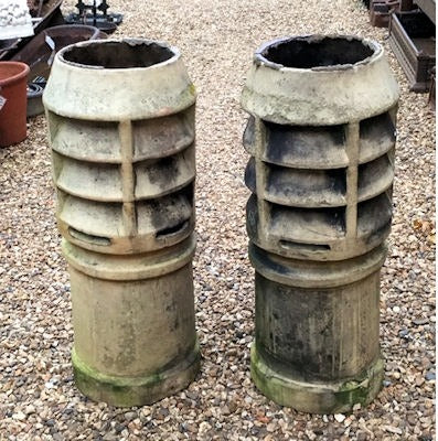 Pair of Buff Coloured Vented Chimney Pots — late 19th century