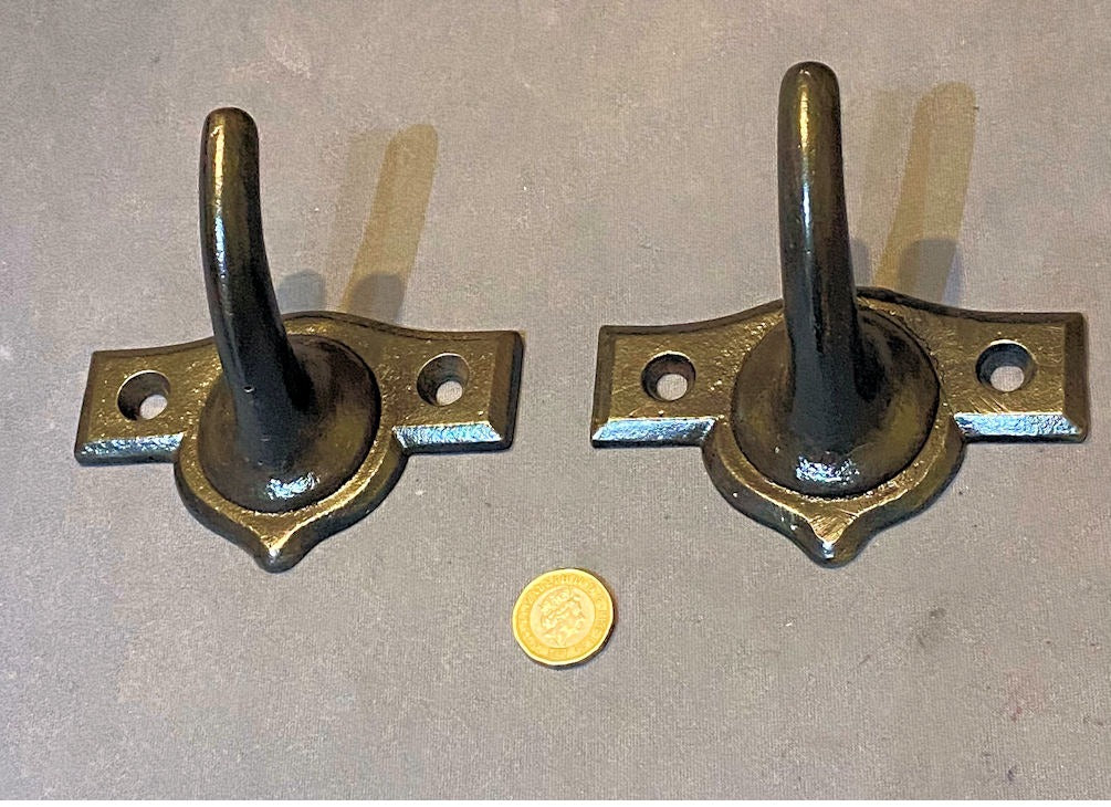 Pair of Cast Iron Harness Room Hooks — Cast iron, late 19th century