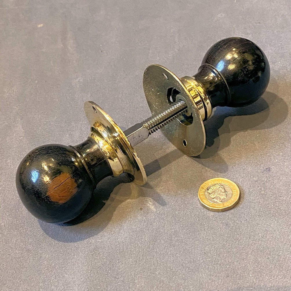 Pair of Ebony and Brass Door Handles — Brass, late 19th century