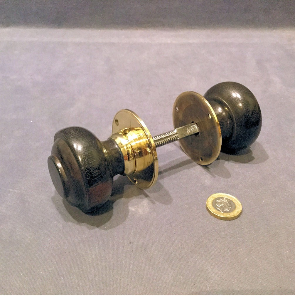 Pair of Ebony Door Handle — Brass, late 19th century