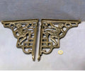 Pair of Figural Cast Iron Wall Brackets — Cast iron, late 19th century